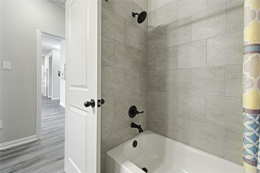 Steel tub and hand tiled shower in 2nd bath