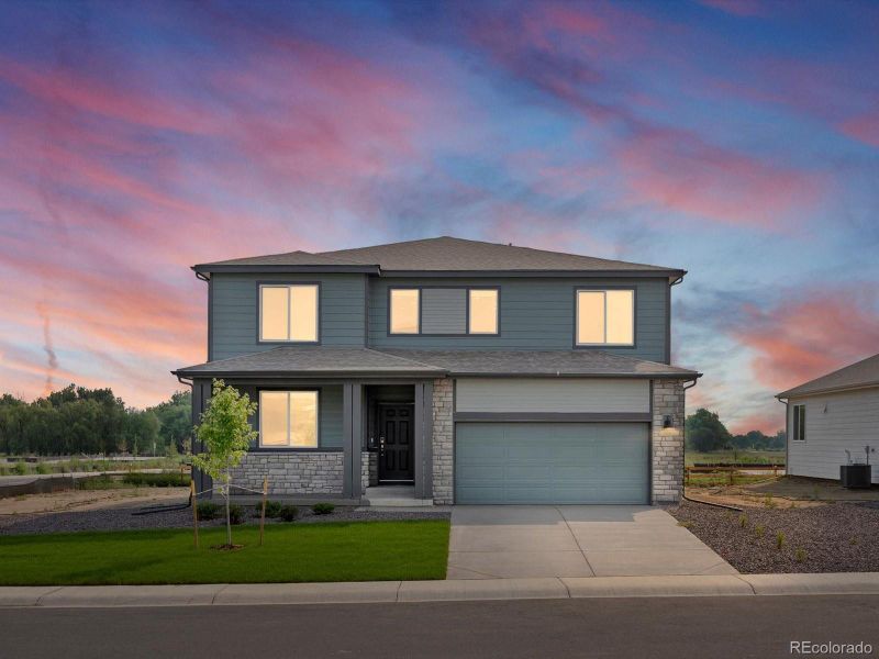 Front exterior of a new home in Poudre Heights: The Lakes Collection, Windsor, CO, highlighting curb appeal (Image 16).