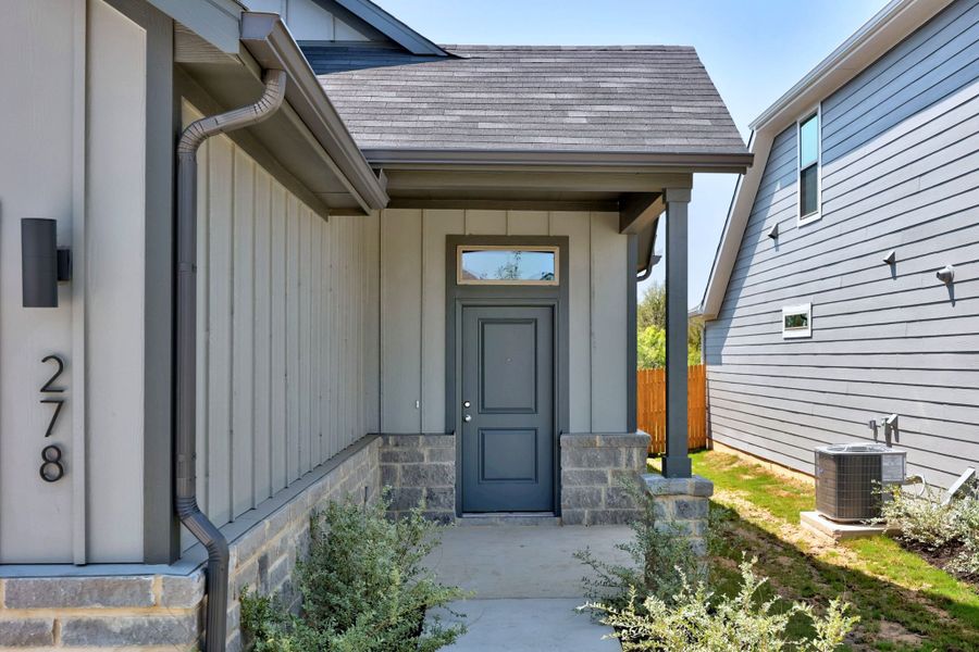 Exterior details and patio area of a home in Trinity Ranch, Elgin (Image 3).