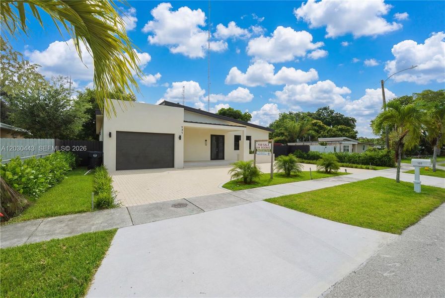 Front exterior of a new home in , West Park, FL, highlighting curb appeal (Image 19).