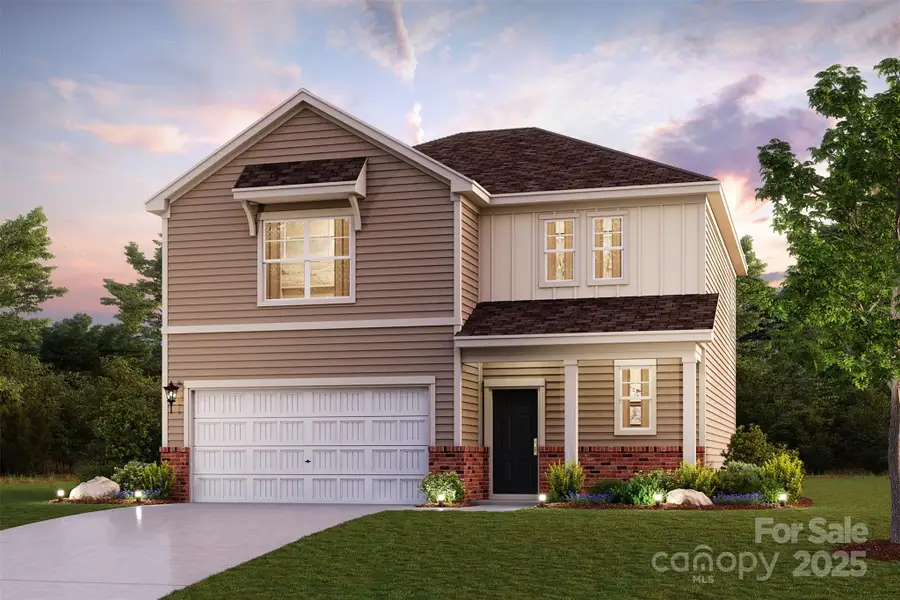Front exterior of a new home in Blue Sky Meadows, Monroe, NC, highlighting curb appeal (Image 1). Front exterior of a new home in Blue Sky Meadows, Monroe, NC, highlighting curb appeal (Image 1).