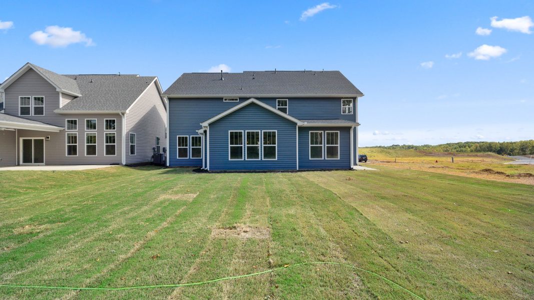 Representative exterior photo of a completed home built from the Stonefield - Finished Basement by DRB Homes in Pinebrook, Woodruff, SC (Image 19).