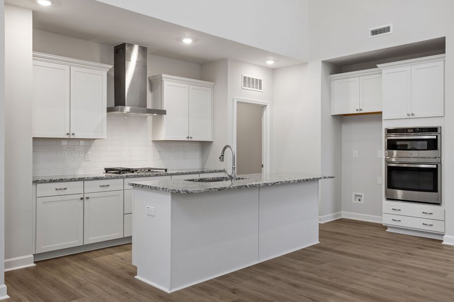 Furnished interior view inside a new home in Ovation at Sweetbrier, Durham (Image 9).