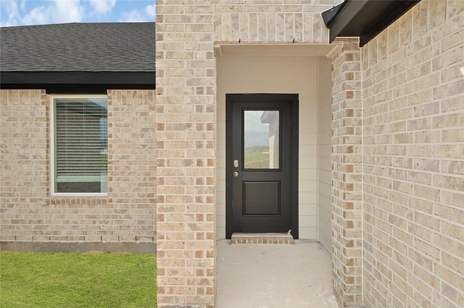 Exterior details and patio area of a home in Blue Heron Estates, Beasley (Image 3).