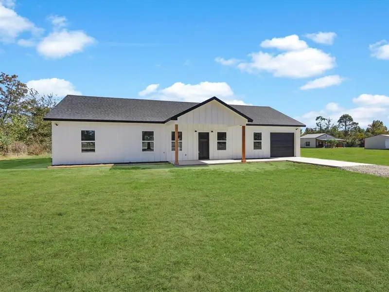 Exterior details and patio area of a home in , Wills Point (Image 4).