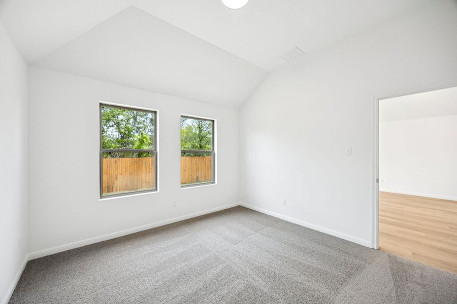 Primary Suite in the Spruce home plan by Trophy Signature Homes - REPRESENTATIVE PHOTO