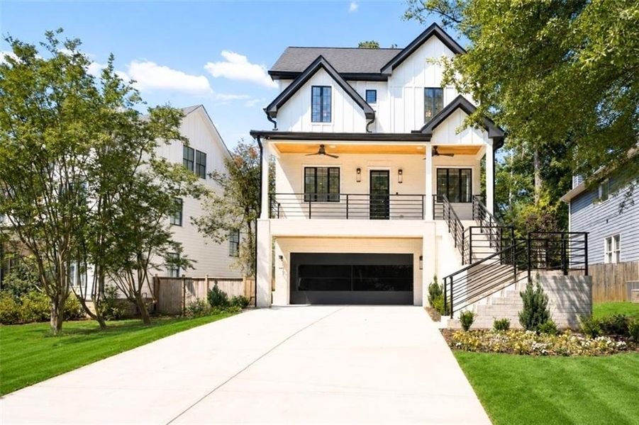 Front exterior of a new home in , Brookhaven, GA, highlighting curb appeal (Image 1). Front exterior of a new home in , Brookhaven, GA, highlighting curb appeal (Image 1).