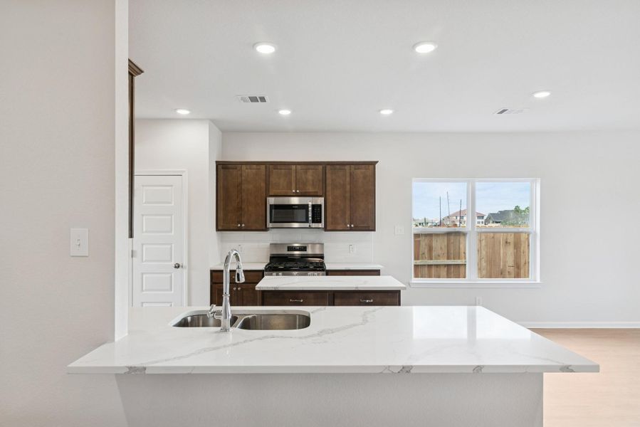 The Georgetown II- Kitchen. Home under construction, photo used for illustrative purposes only, colors and options will vary.