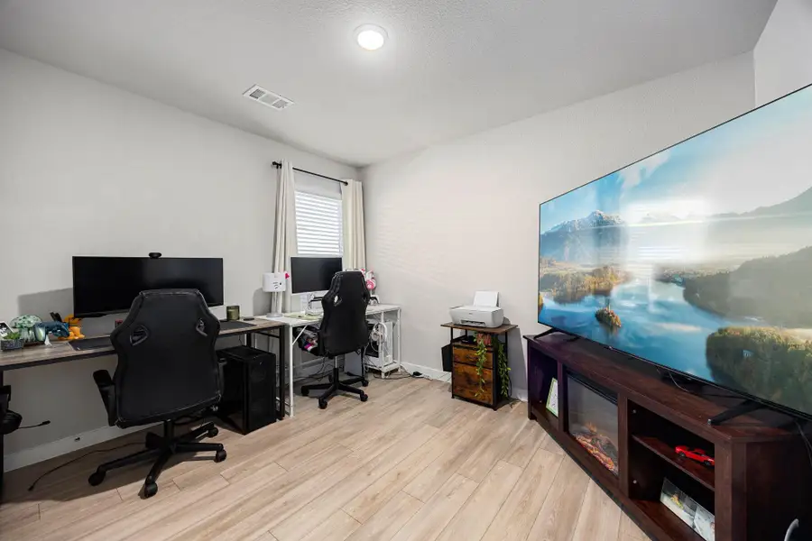 Furnished interior view inside a new home in Marvida, Cypress (Image 10).