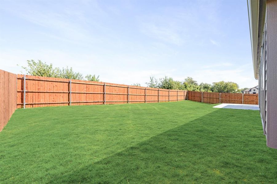 Exterior details and patio area of a home in The Grove, Midlothian (Image 3).