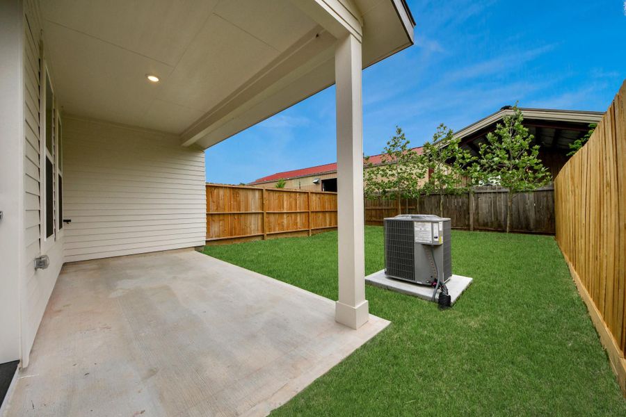 Exterior details and patio area of a home in , Houston (Image 4).