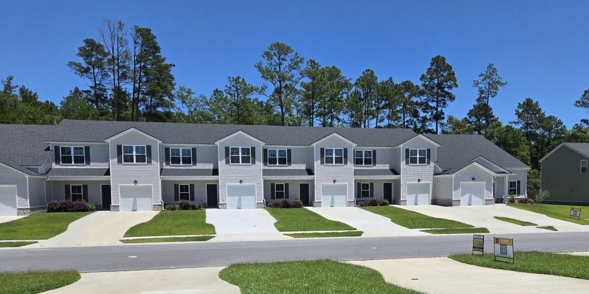 Front exterior of a new home in New Haven At Belmont Glen, Guyton, GA, highlighting curb appeal (Image 25). Front exterior of a new home in New Haven At Belmont Glen, Guyton, GA, highlighting curb appeal (Image 25).
