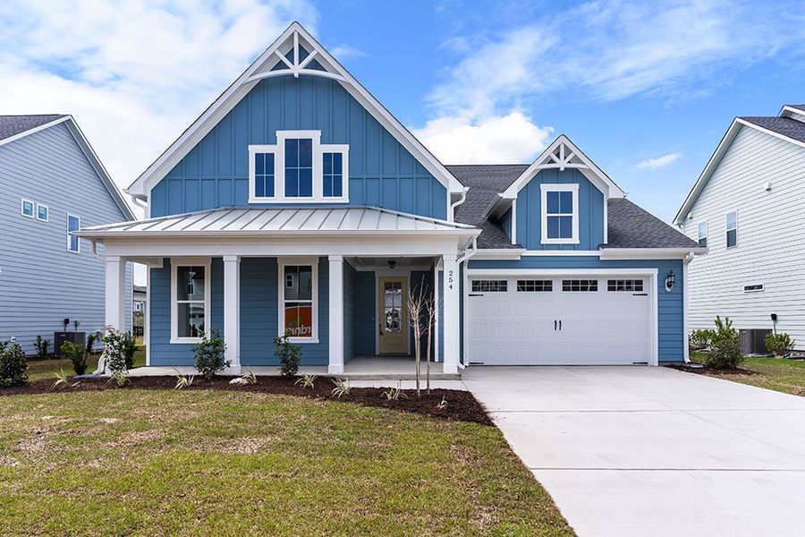 Representative exterior photo of a completed home built from the The Sutton by RobuckHomes in Windwater, Hampstead, NC (Image 12). Representative exterior photo of a completed home built from the The Sutton by RobuckHomes in Windwater, Hampstead, NC (Image 12).