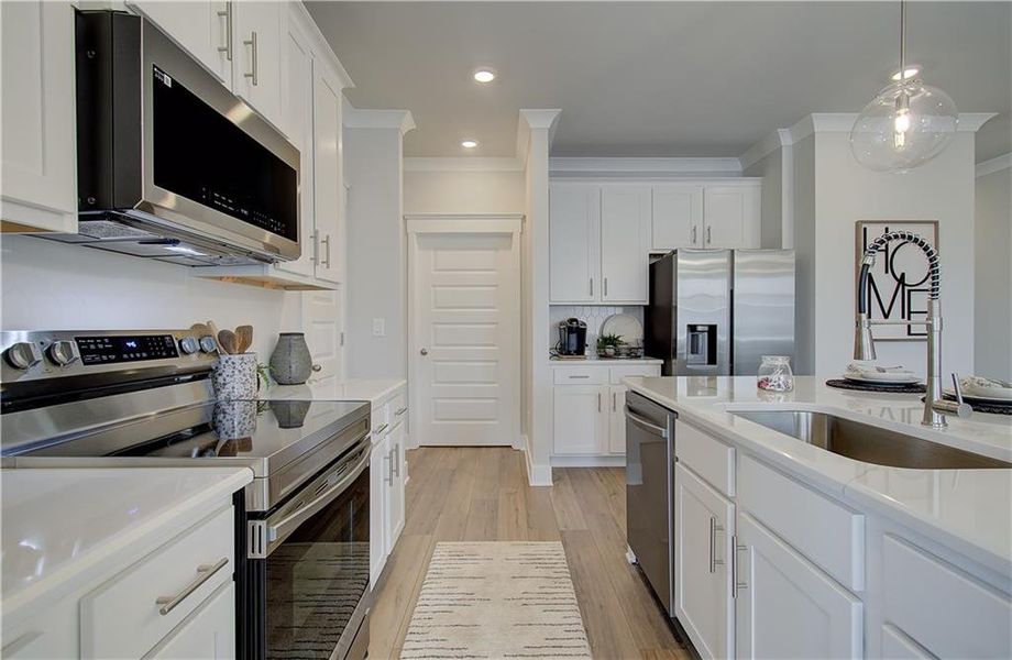 Furnished interior view inside a new home in The Towns at Auburn Station East, Auburn (Image 15).