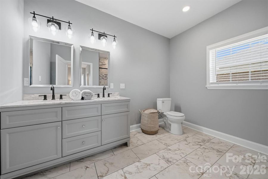 Furnished interior view inside a new home in , Lenoir (Image 12).
