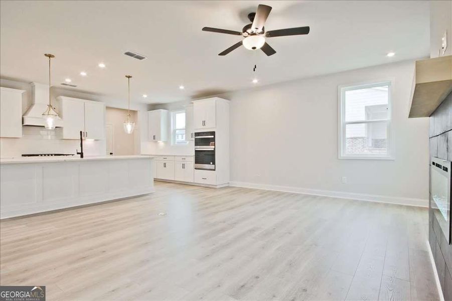 Spacious, unfurnished interior of a new home in The Paddocks at Doc Hughes, Buford (Image 42).