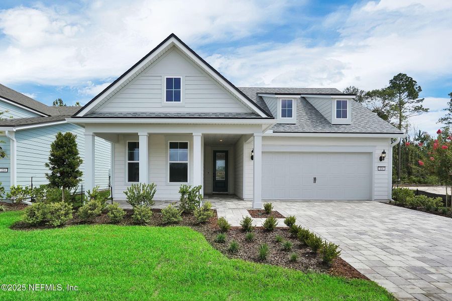 Front exterior of a new home in Del Webb Saint Johns, St. Johns, FL, highlighting curb appeal (Image 15).