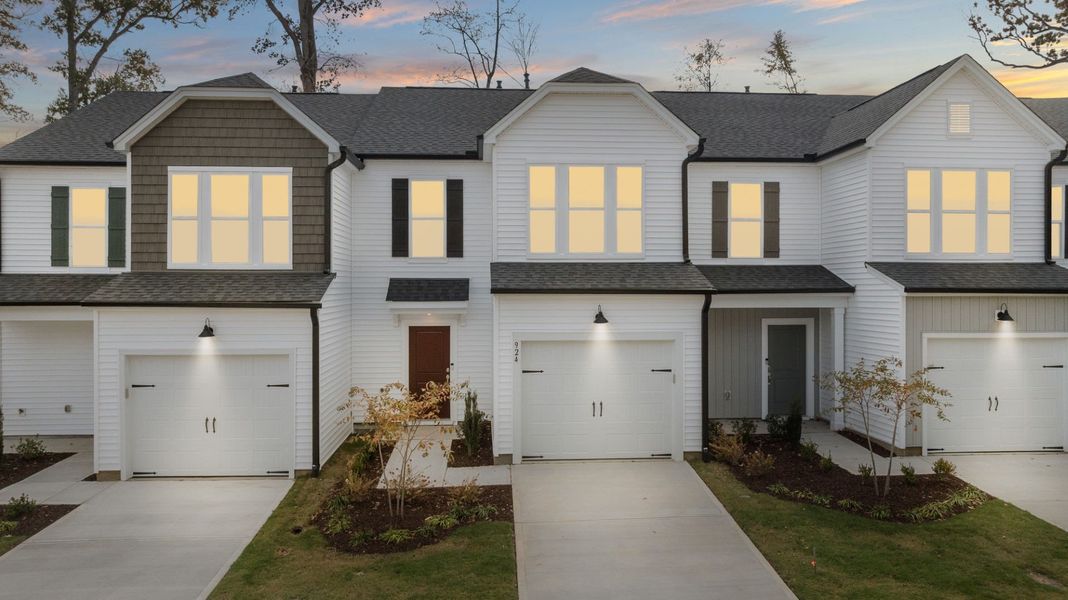 Front exterior of a new home in Poets Walk, Whitsett, NC, highlighting curb appeal (Image 2).