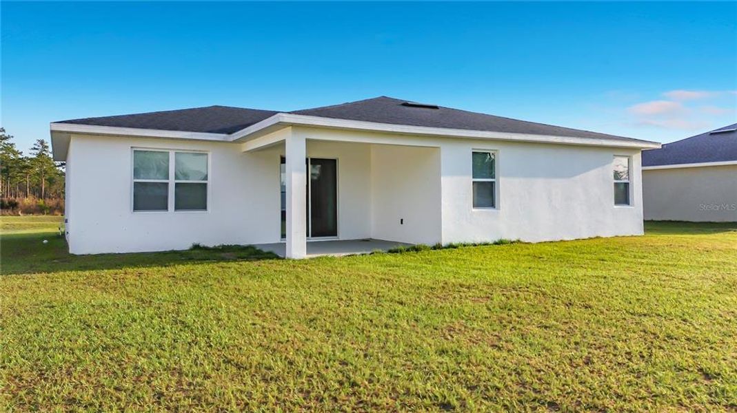 Exterior details and patio area of a home in , Ocala (Image 18).