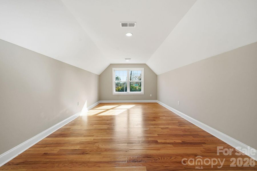 Sun-filled flex space with vaulted ceilings — great for a playroom, studio, or home office. Sun-filled flex space with vaulted ceilings — great for a playroom, studio, or home office.