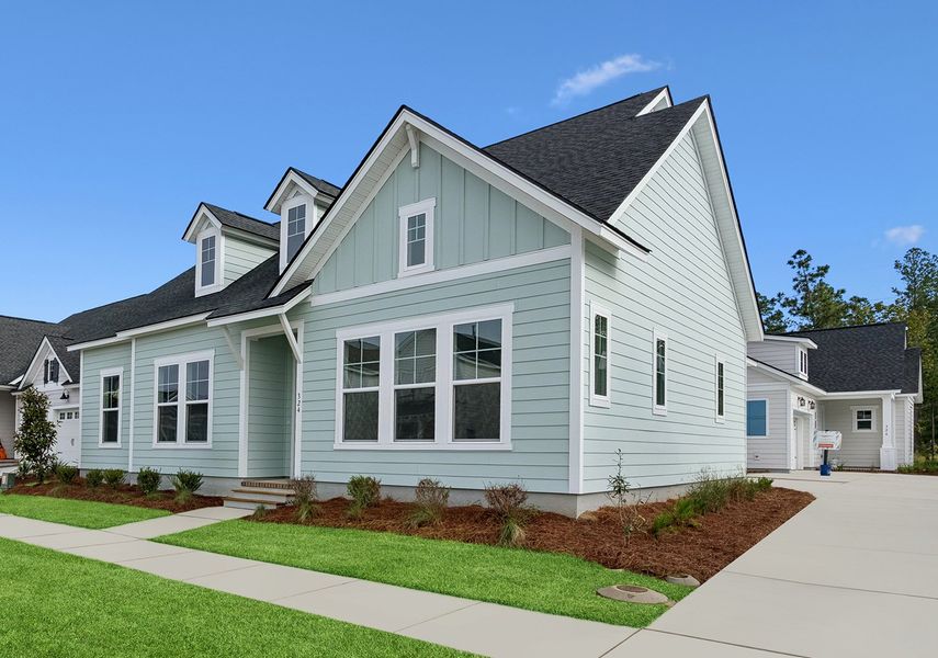 Front exterior of a new home in Nexton – Midtown – The Garden Collection, Summerville, SC, highlighting curb appeal (Image 21). Front exterior of a new home in Nexton – Midtown – The Garden Collection, Summerville, SC, highlighting curb appeal (Image 21).