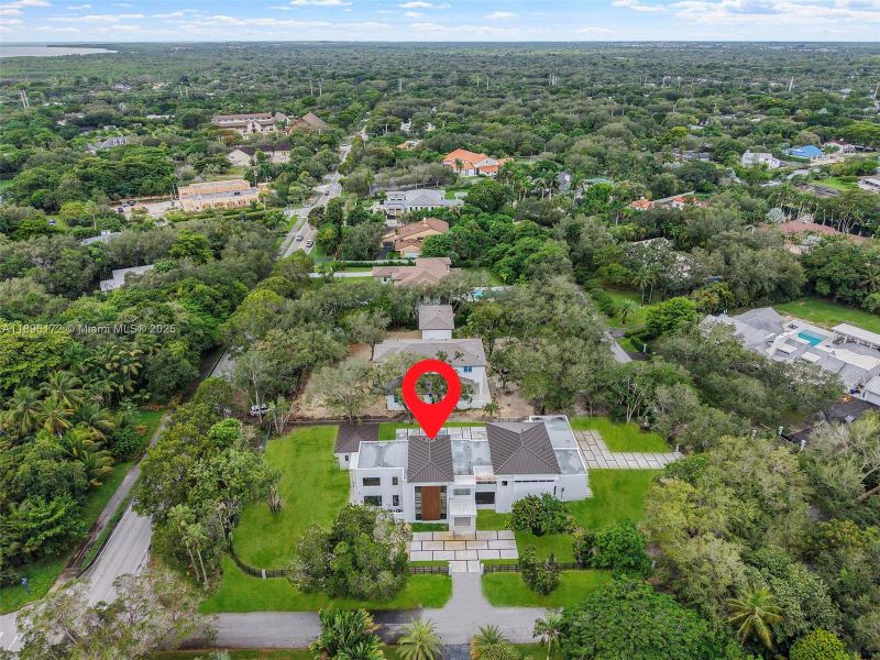 Front exterior of a new home in , Palmetto Bay, FL, highlighting curb appeal (Image 2). Front exterior of a new home in , Palmetto Bay, FL, highlighting curb appeal (Image 2).