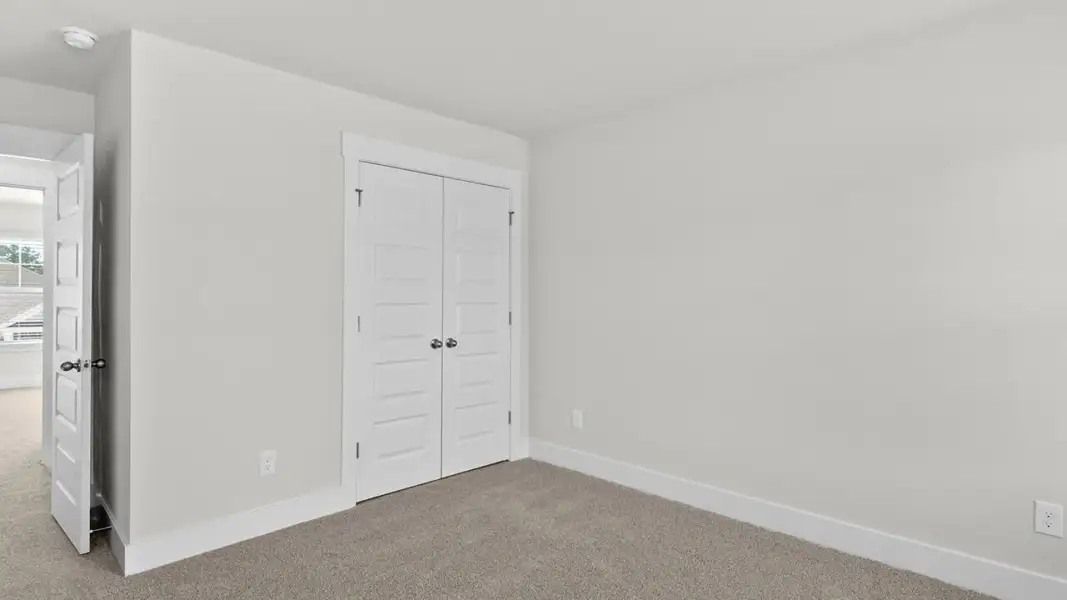 Spacious, unfurnished interior of a new home in The Highlands at Cedar Hill Landing, Navassa (Image 28).