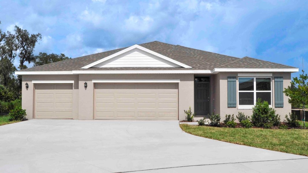 Representative exterior photo of a completed home built from the Denham by D.R. Horton in Rye Crossing, Parrish, FL (Image 1).