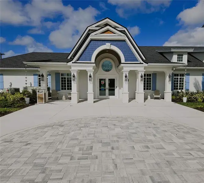 Front exterior of a new home in Palmera at Wellen Park, Venice, FL, highlighting curb appeal (Image 1). Front exterior of a new home in Palmera at Wellen Park, Venice, FL, highlighting curb appeal (Image 1).