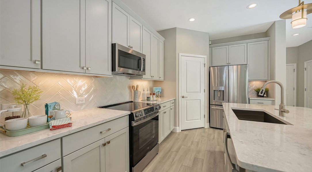 Representative furnished interior of a home built from the Parker by Neal Communities in SkySail, Naples (Image 16).