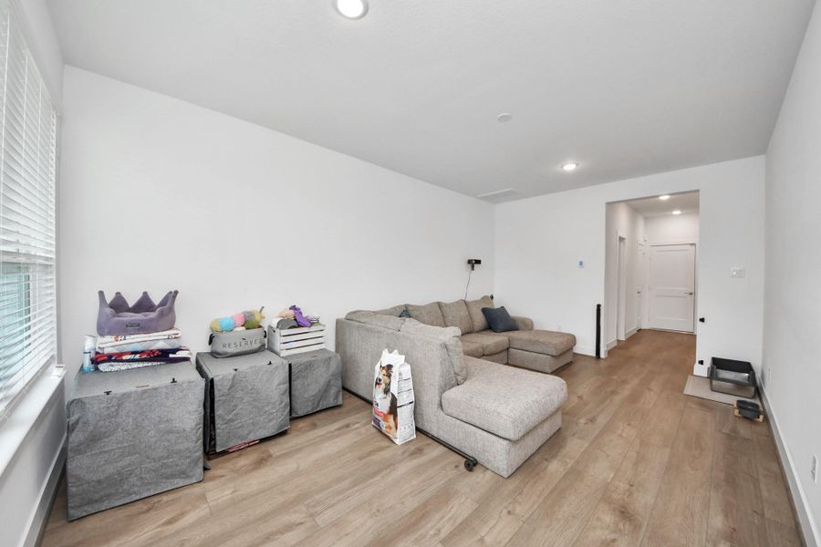 Furnished interior view inside a new home in Meridiana Courtyard Collection, Manvel (Image 9).