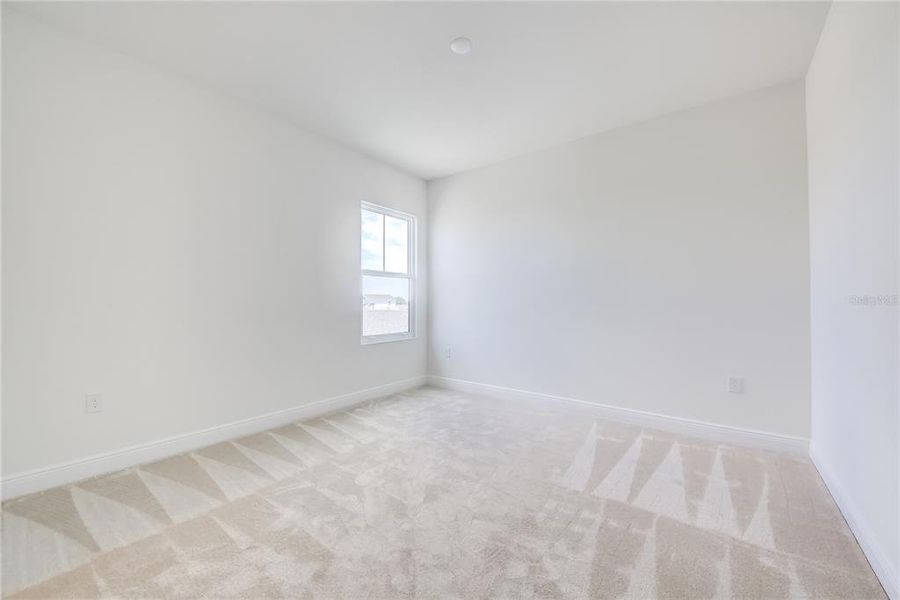 Spacious, unfurnished interior of a new home in Bungalow Walk at Lakewood Ranch, Sarasota (Image 41).