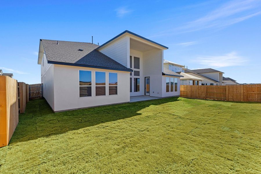 Exterior details and patio area of a home in Lariat, Liberty Hill (Image 4).