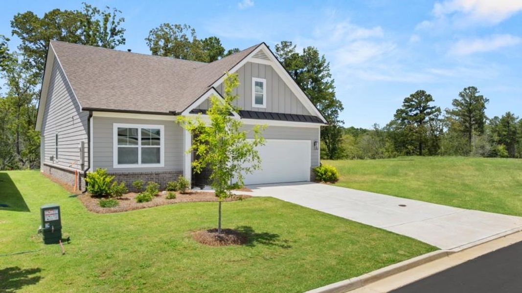 Front exterior of a new home in Hamptons at Riverwood North, Dallas, GA, highlighting curb appeal (Image 21).