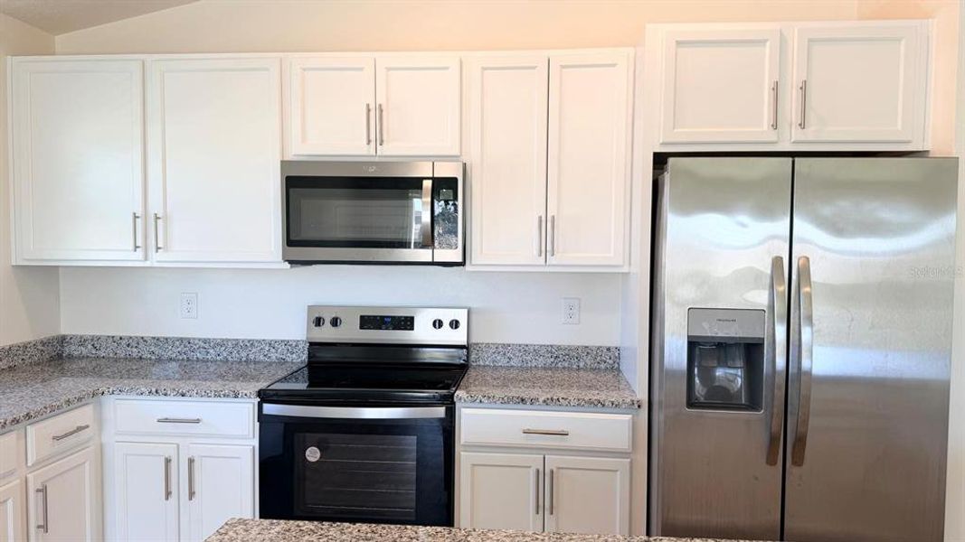 Furnished interior view inside a new home in Lake Lucerne, Winter Haven (Image 6).