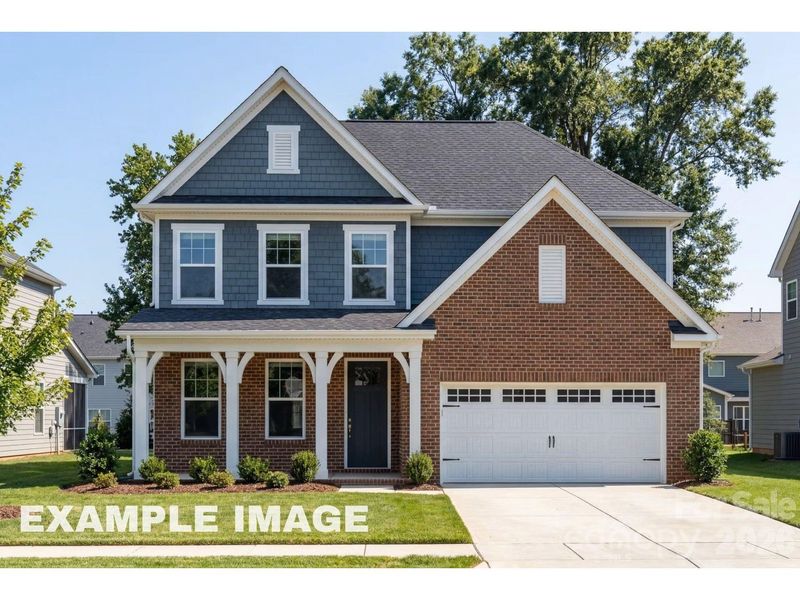 Front exterior of a new home in Windgate, Mooresville, NC, highlighting curb appeal (Image 1). Front exterior of a new home in Windgate, Mooresville, NC, highlighting curb appeal (Image 1).