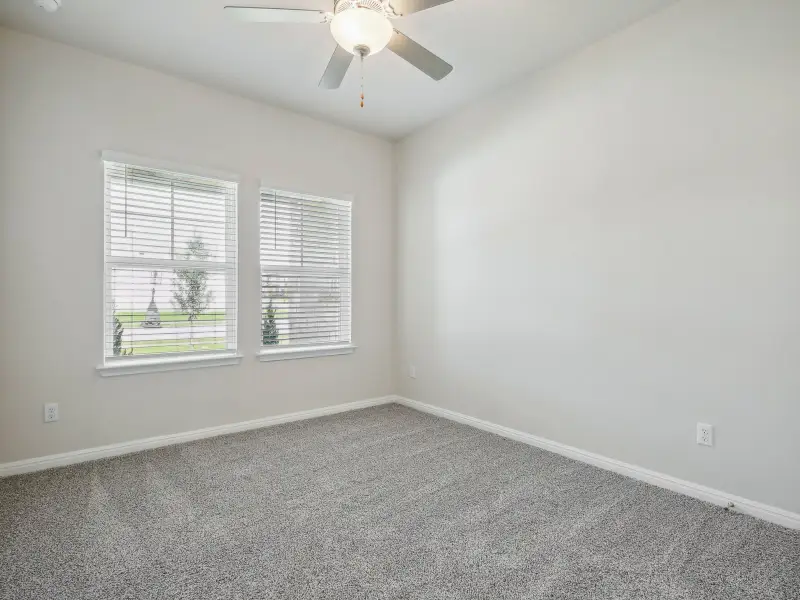 Spacious, unfurnished interior of a new home in Big Sky Ranch - Reserve Collection, Dripping Springs (Image 12).