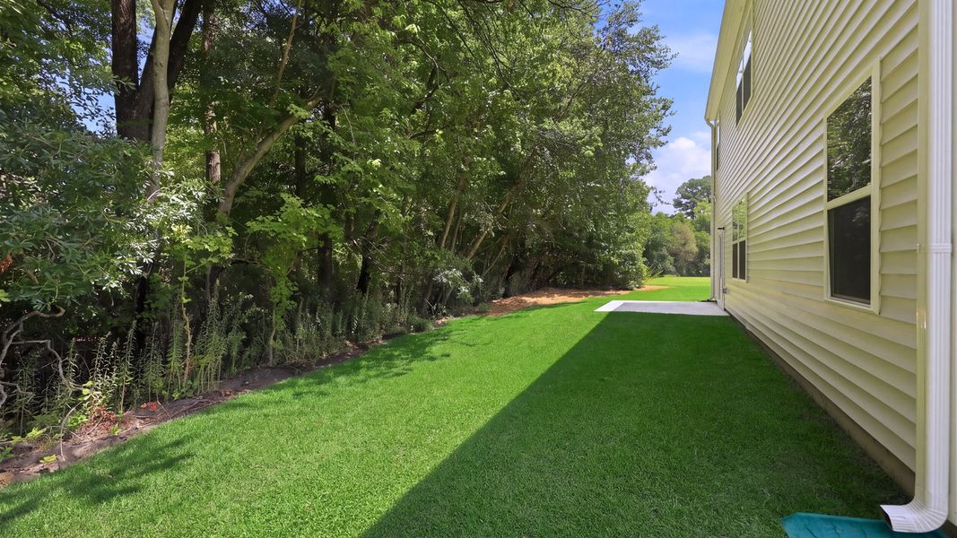 Exterior details and patio area of a home in Villa Grande, Winterville (Image 4).