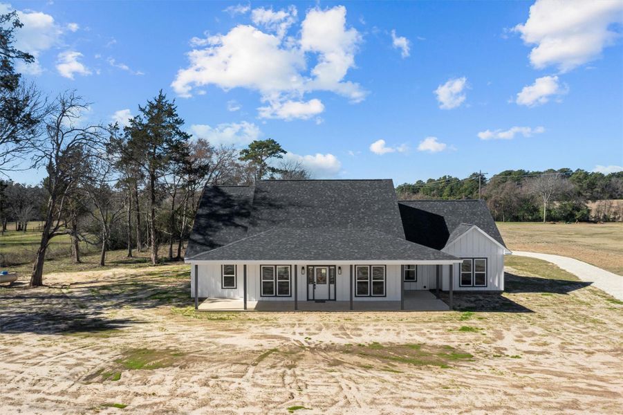 Front exterior of a new home in , Grapeland, TX, highlighting curb appeal (Image 22).