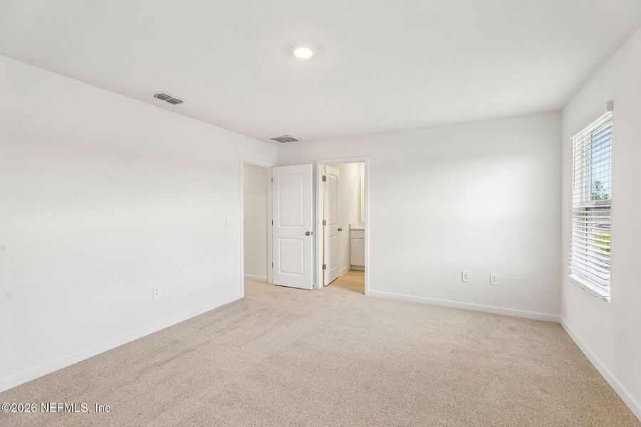 Spacious, unfurnished interior of a new home in The District at Oakleaf - The Grove, Middleburg (Image 19).