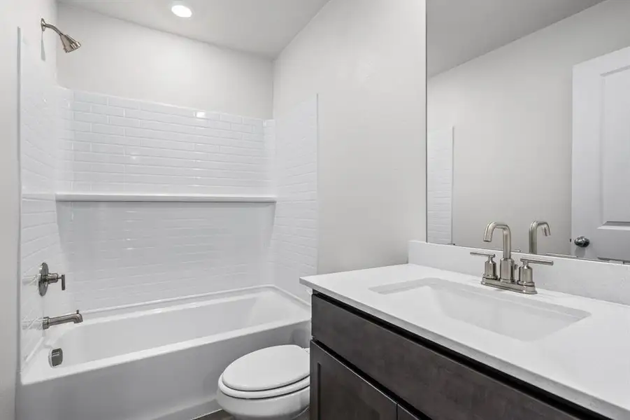 Full bathroom featuring  shower combination and vanity