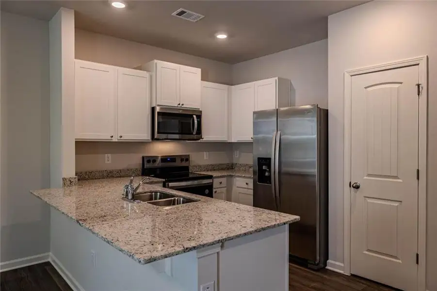Furnished interior view inside a new home in Old Summerville Village, Rome (Image 4). Furnished interior view inside a new home in Old Summerville Village, Rome (Image 4).