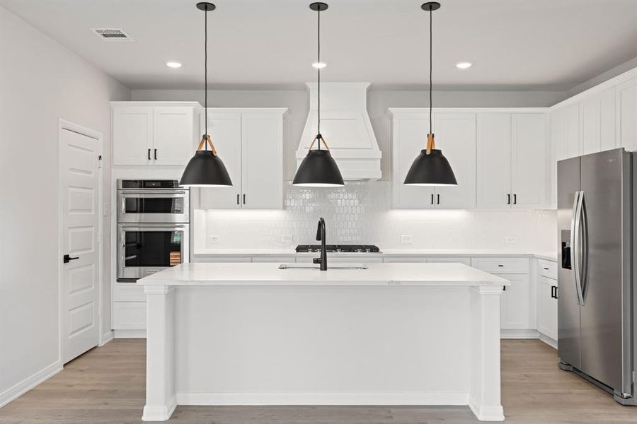 Beautiful cabinetry, lovely backsplash, gorgeous countertops, stainless appliances....what more could you ask for in your dream kitchen?