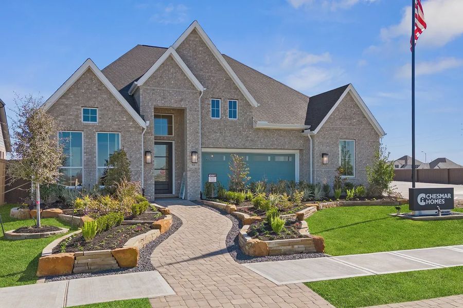 Front exterior of a new home in Brookewater 60's, Rosenberg, TX, highlighting curb appeal (Image 2).