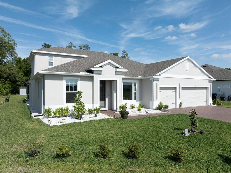 Front exterior of a new home in , Mount Dora, FL, highlighting curb appeal (Image 21).