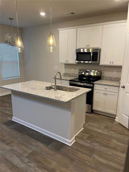 Furnished interior view inside a new home in , Hampton (Image 6).