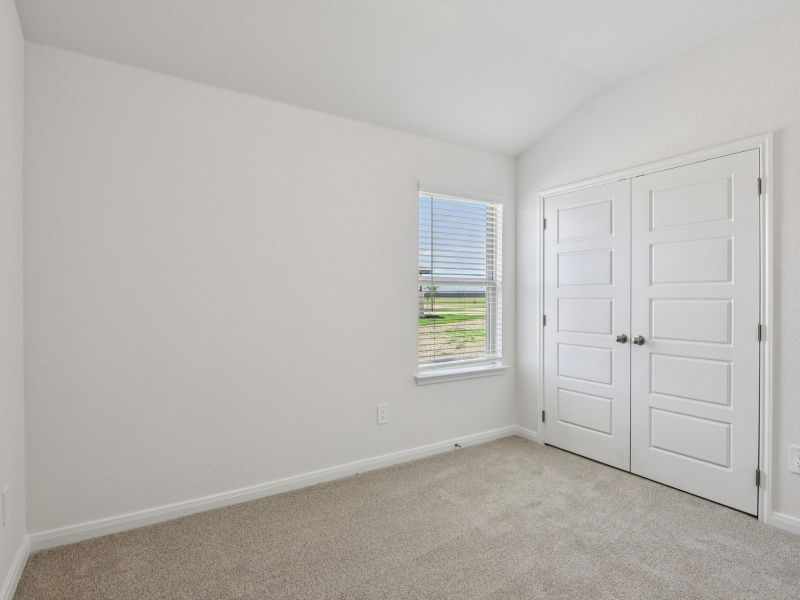 Guest bedroom in the Allen floorplan at a Meritage Homes community. Guest bedroom in the Allen floorplan at a Meritage Homes community.