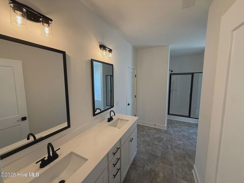 Furnished interior view inside a new home in Wood Creek Landing, Leland (Image 4).