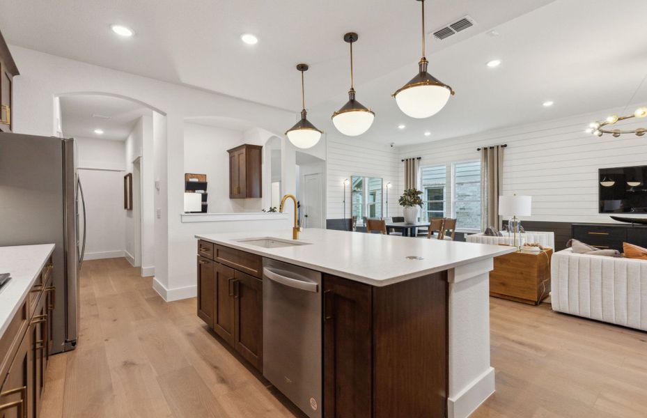 Large kitchen island with pendant lighting