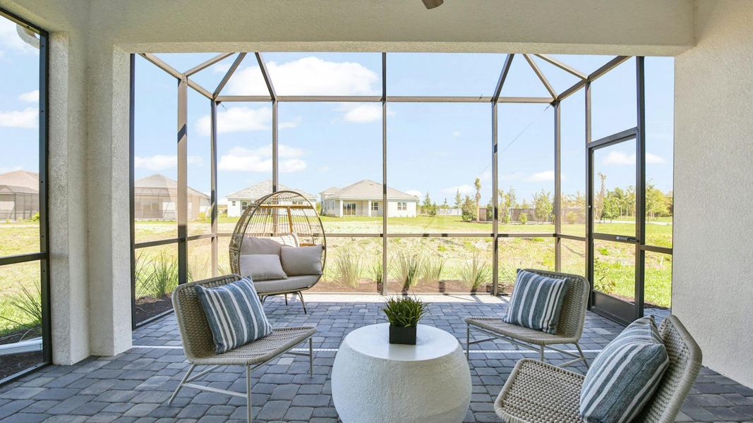Exterior details and patio area of a home in Palm Grove Real Estate and Homes for Sale in Lakewood Ranch, FL - Neal Communities, Lakewood Ranch (Image 4).